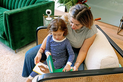 Mother and child with Nanit baby monitor