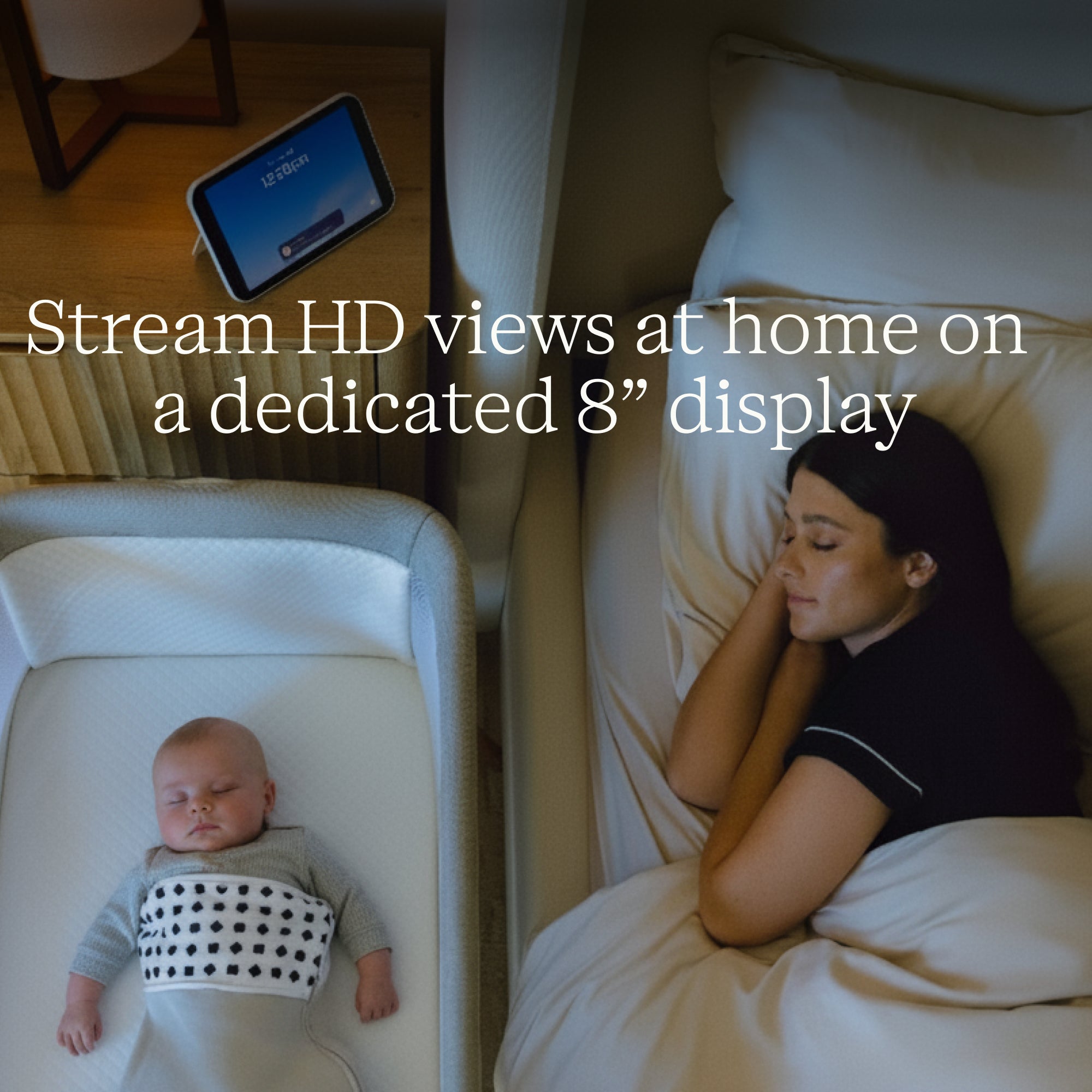 Woman lying on a bed next to a baby in a crib with text about streaming HD views.