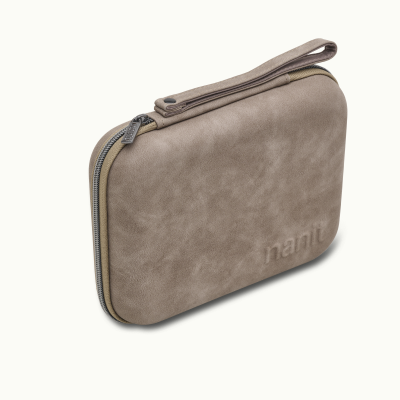 angled image of greige travel case