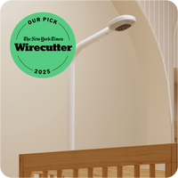 Nanit Pro Baby Monitor + Floor Stand looking at crib with "our pick 2025: NYT Wirecutter" dotwhack in green