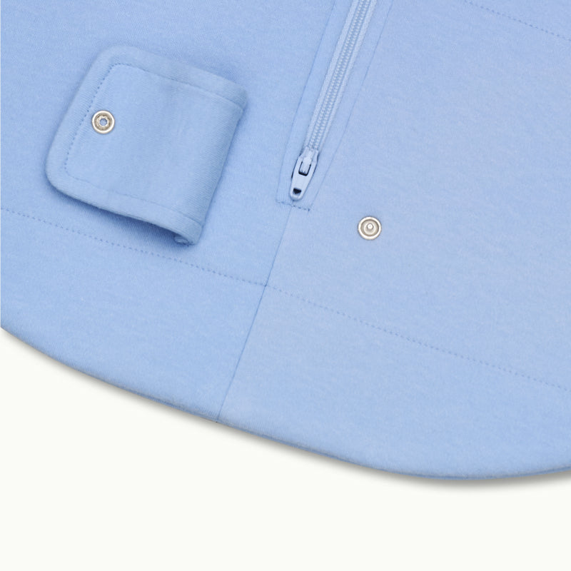 zoomed in on two-way bottom zipper on sleeping bag in cornflower blue #color_cornflower blue