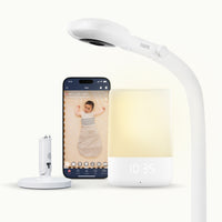 Smart home devices including a Sound + Light, phone, and Pro Baby Monitor + Floor Stand, and Flex Stand on a white background
