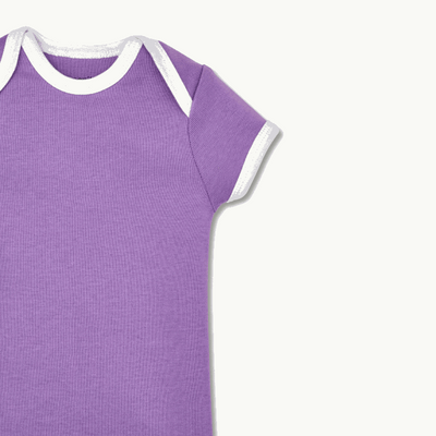 zoomed in on expandable lap shoulder neckline for easy on/off on short sleeve bodysuit violet