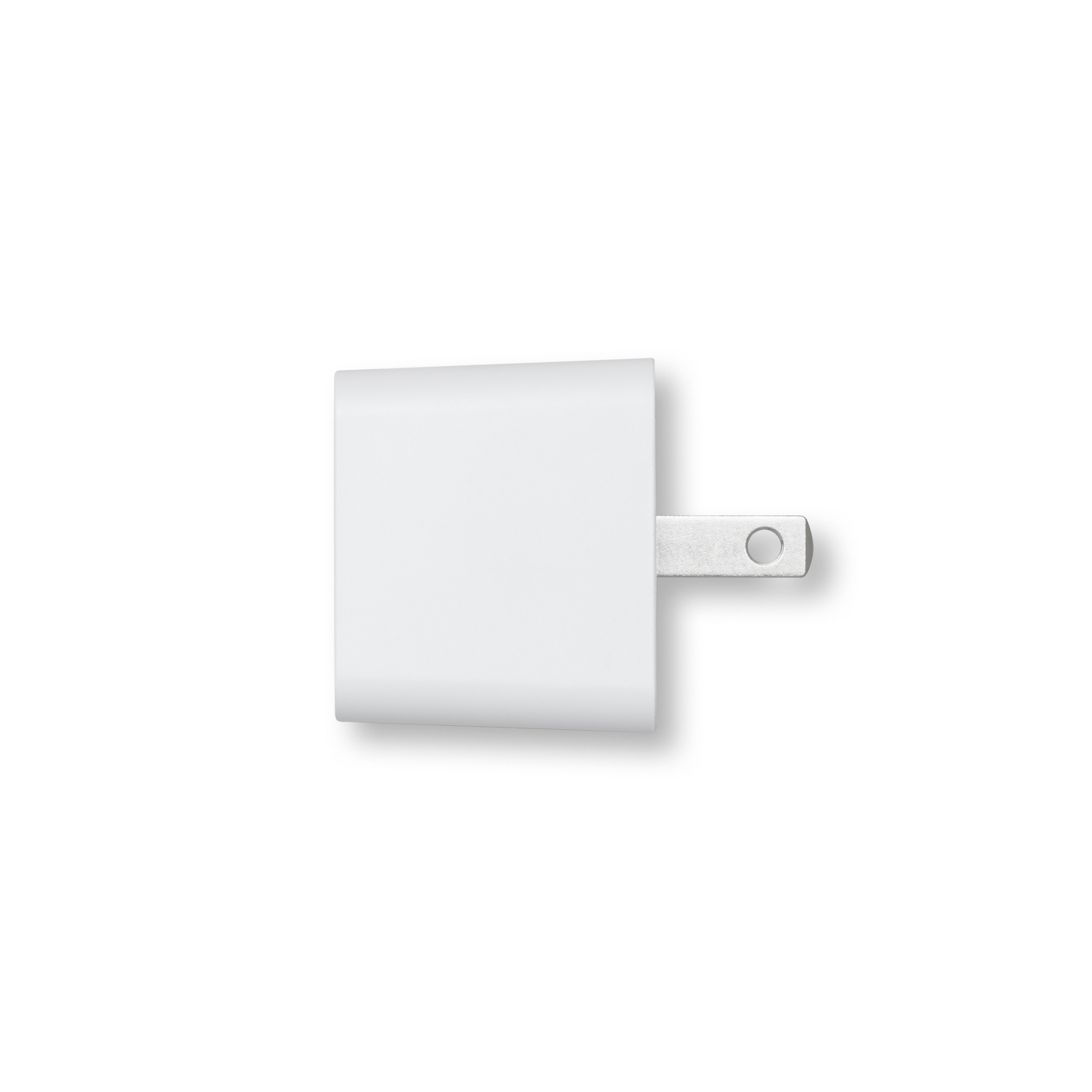 A minimalist white wall charger adapter with a square body and a single flat plug, shown on a clean white background with a soft drop shadow.