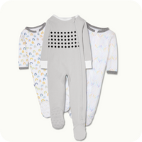 nanit breathing wear pajamas in grey, and Nanit Sleep Wear Pajamas in Sweet Rainbows and Chevron Raindrops