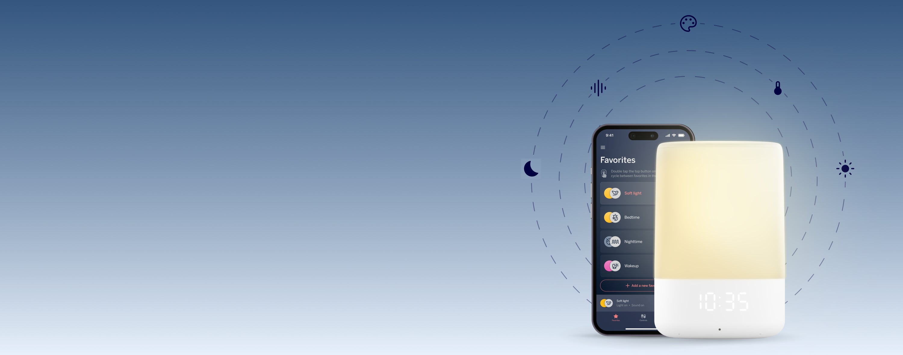 nanit sound and light machine with mobile displaying nanit app