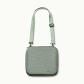 nanit traveling light case with shoulder strap in green oxford #color_green oxford