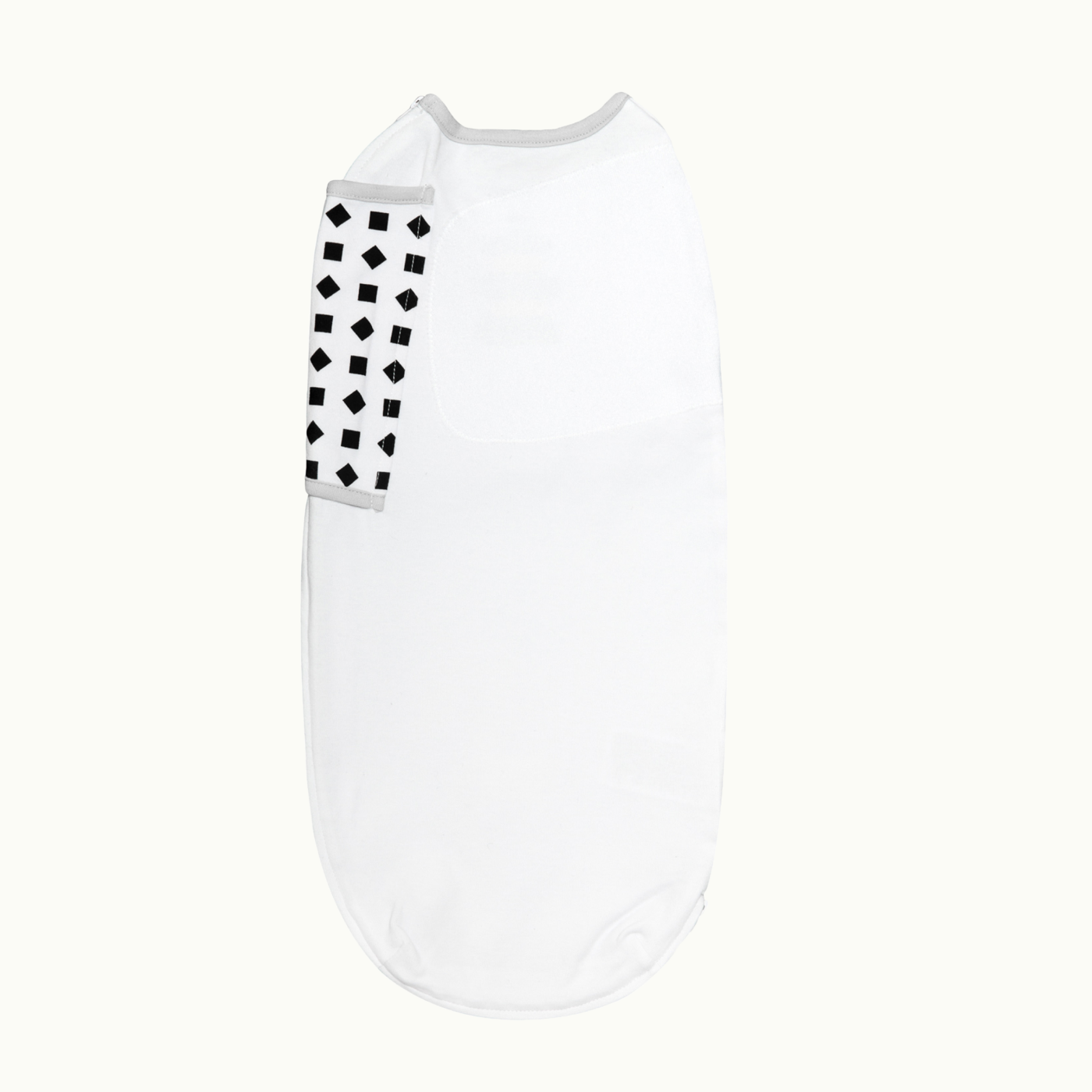 back side of nanit swaddle in white
