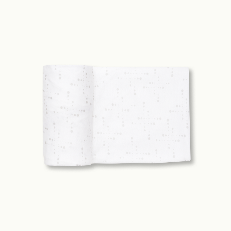 Nanit Knit Crib Sheet - White Sunburst Crib Sheet rolled #color_white sunburst
