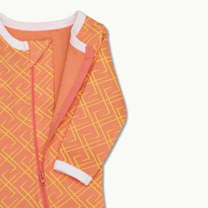 zoomed in on front view of pajama protective chin zipper guard with zipper opened in go between 