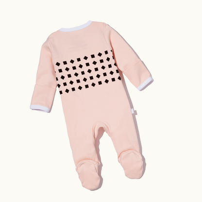 backside of pajama showing in blush pink 