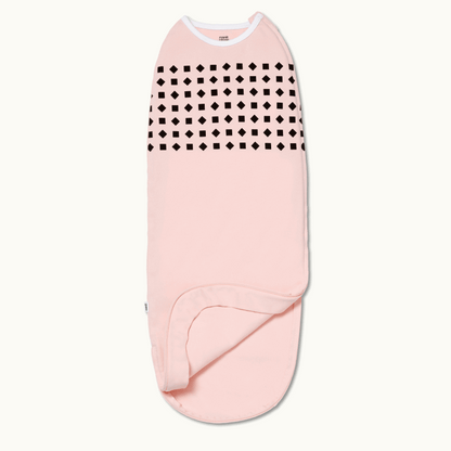 nanit breathing wear swaddle in blush pink 
