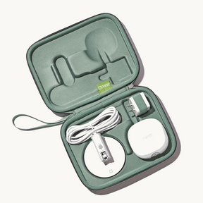 inside nanit travel case in green with nanit pro camera, flex stand, and power adapter #color_green
