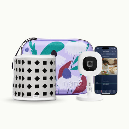 purple floral travel case, phone showing nanit app, Nanit Pro Camera + Flex Stand, Breathing Band 