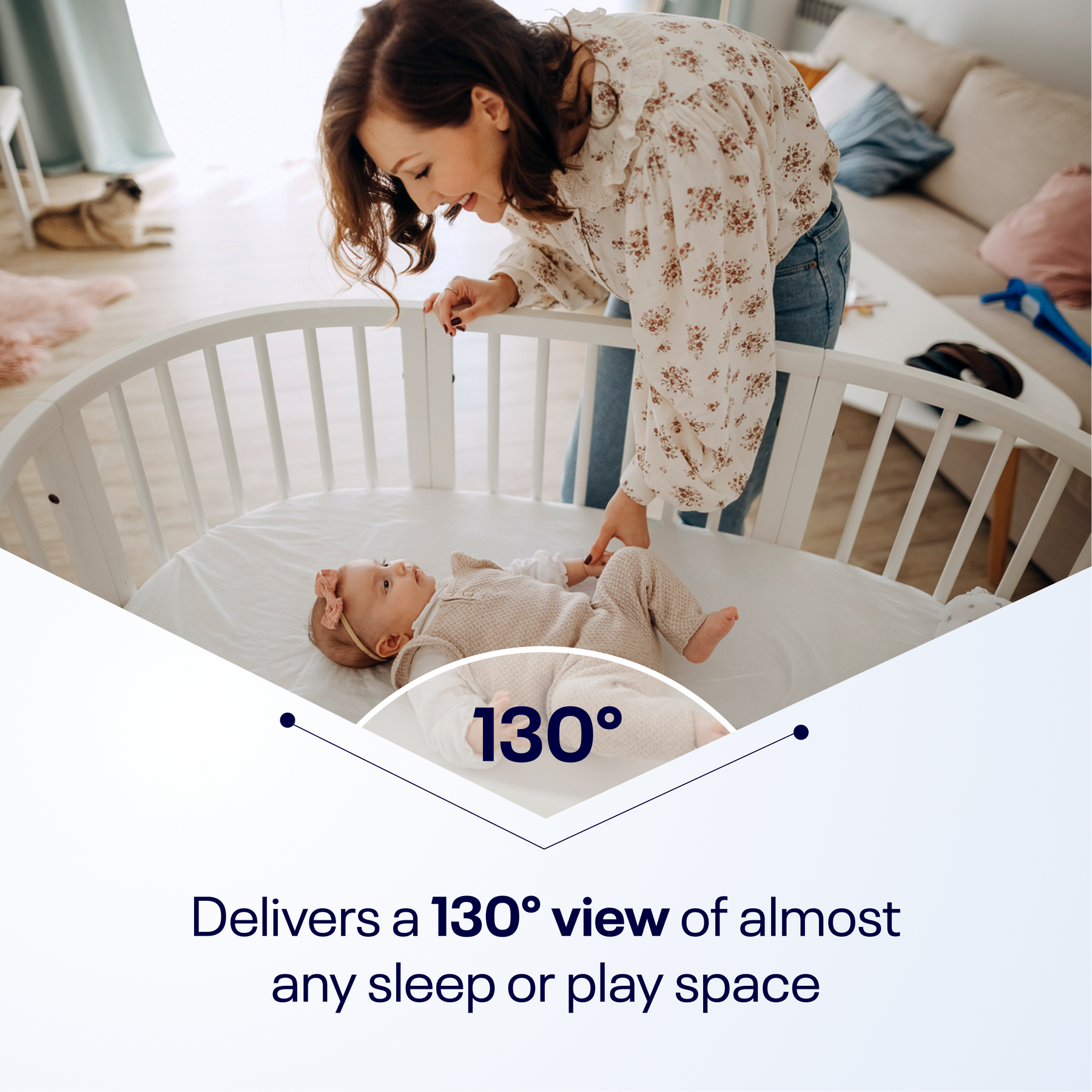 Nanit Flex Stand delivers as 130° view of almost any sleep or play space. Mom looking at baby who is in crib.