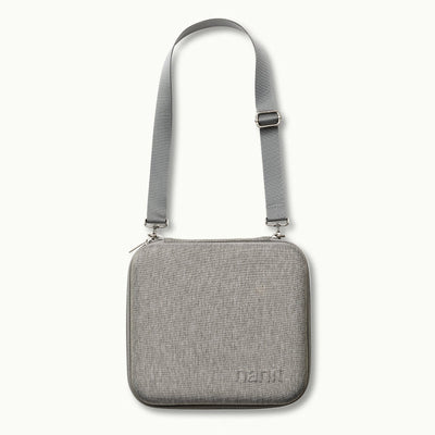 nanit traveling light case with shoulder strap in heather gray oxford 