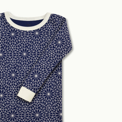 zoomed in on Nanit Two-Piece Sleep Wear Holiday Pajamas in Bright Star 