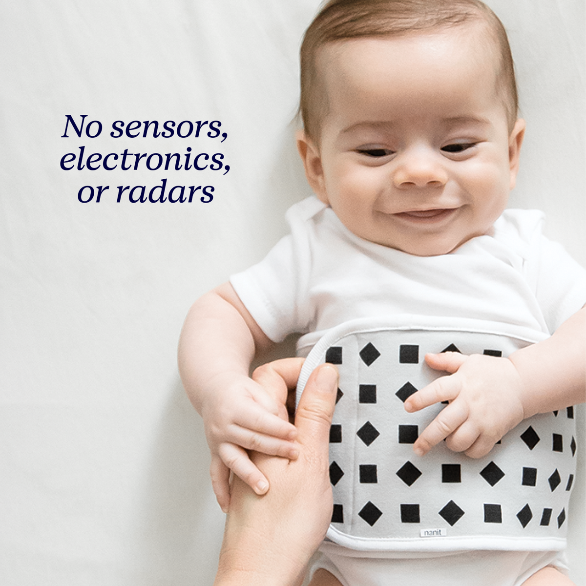 baby wearing breathing band - no sensors, electronics, or radars