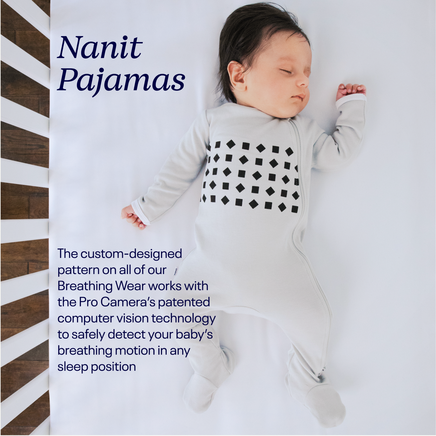 Baby sleeping in gray pajamas - works with Pro Camera's patented computer vision technology to detect baby's breathing motion
