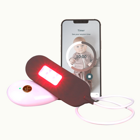 Mommy Matters NeoHeat Perineal Heater front size red LED on with app showing timer