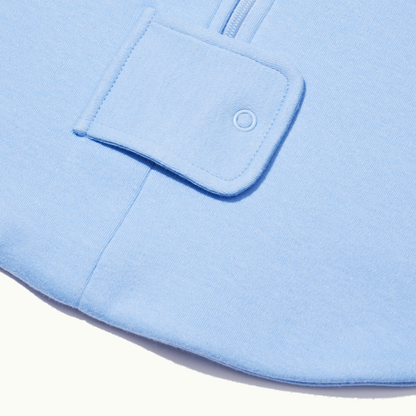 zoomed in on two-way bottom zipper on sleeping bag in cornflower blue 