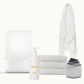 nanit sound + light, ellaola body lotion, lalo hooded towel, 6 lalo stacking cups in black & white, & lalo washcloth