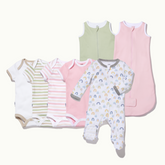 4 bodysuits, 2 sleeping bags, & 1 PJ in white, pistachio stripe, blush pink stripe, blush pink, pistachio & sweet rainbows #color_pink