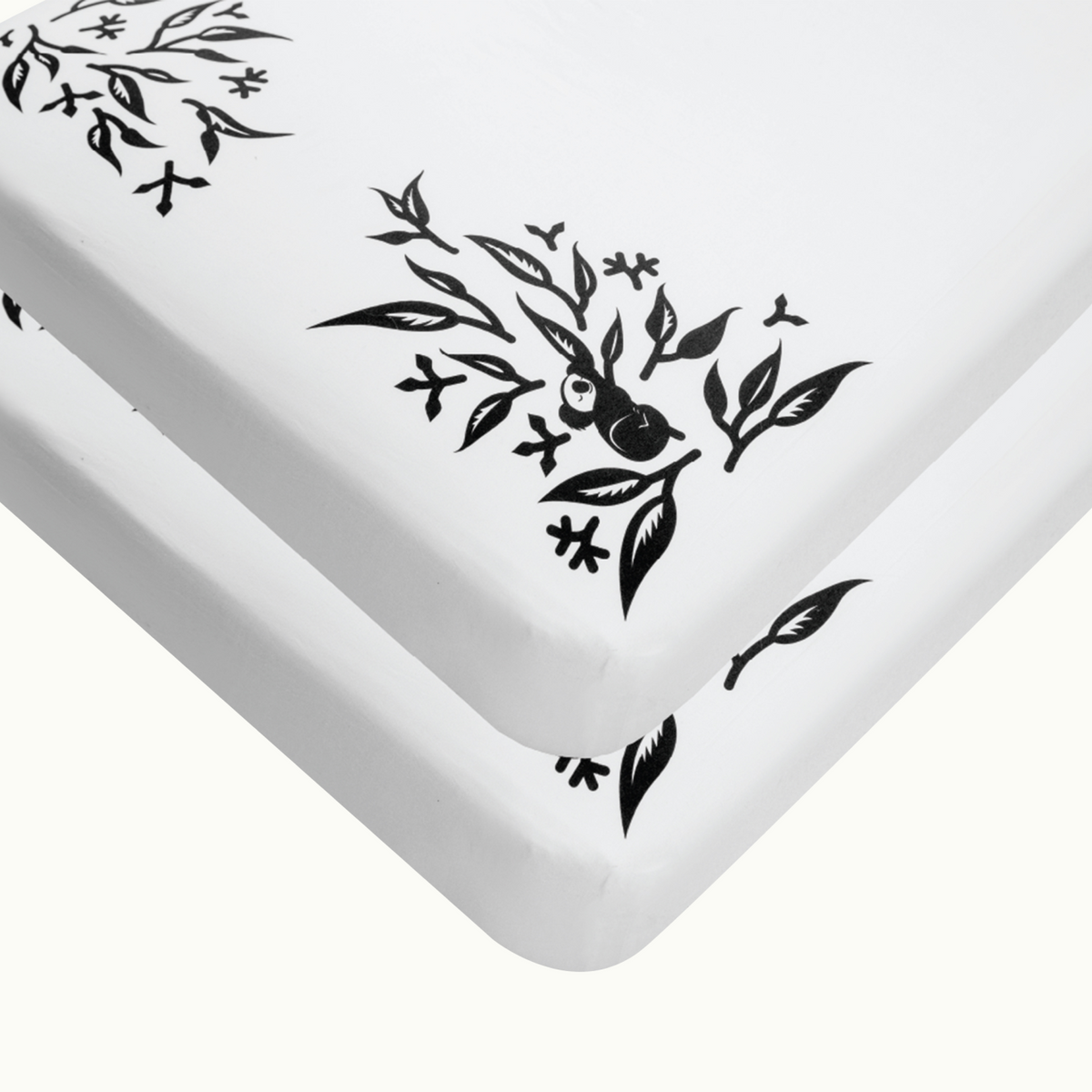 two white nanit smart sheets #color_white