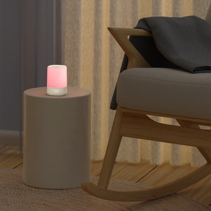 sound and light with pink light on top of side table